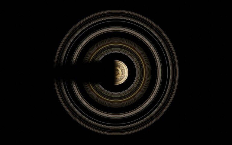 a black and white photo of the earth's rings